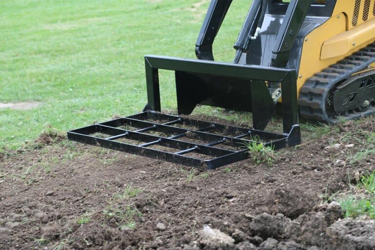 Vermeer S925TX Mini Loader with Land Leveler attachment