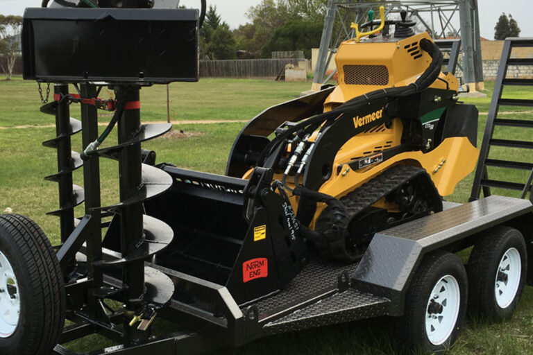Vermeer mini loader contractor package with augers and 4-in-1 bucket